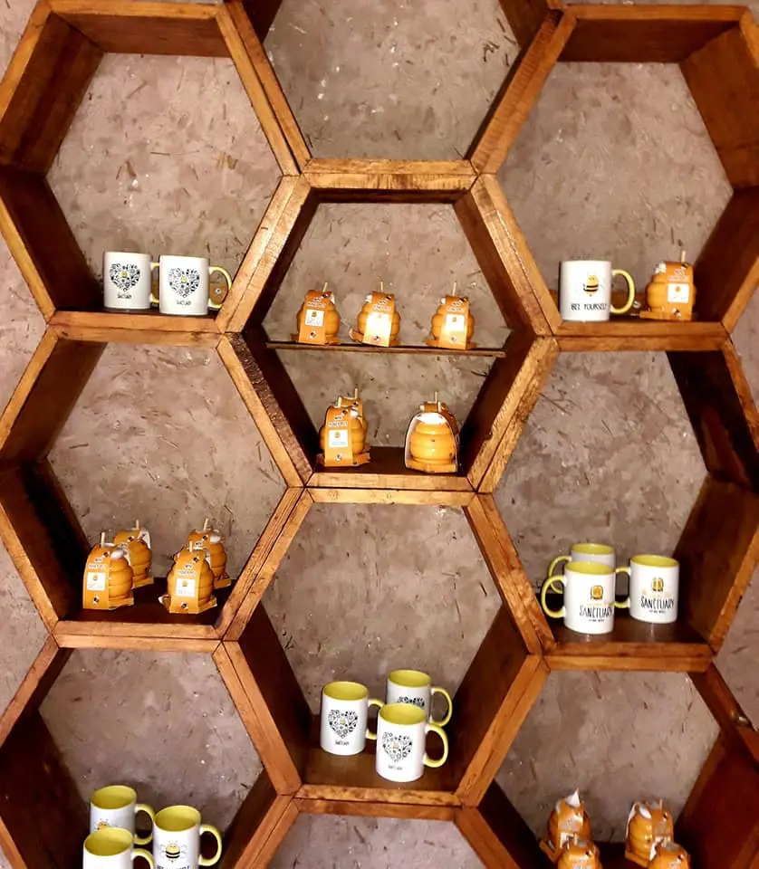 Mayan Bee Sanctuary self with honey jars and cups